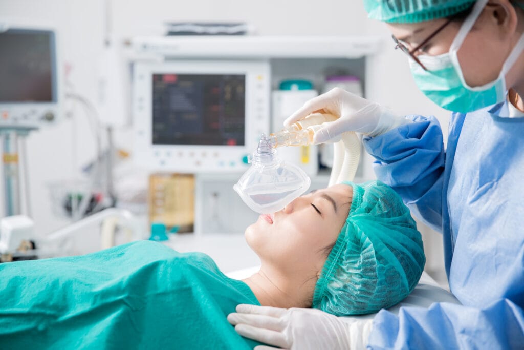 Patient receiving anesthesia before surgery